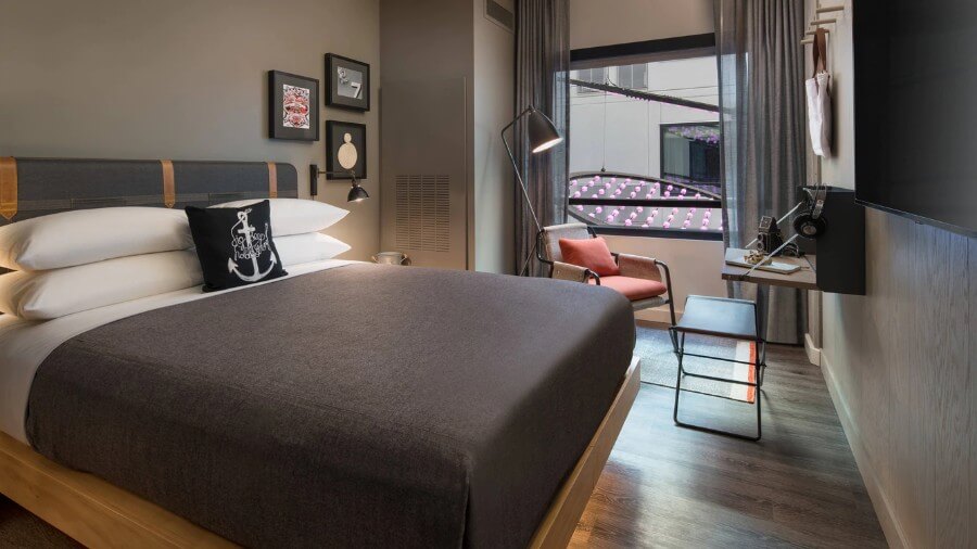 Moxy hotel room by Marriott with bed and window