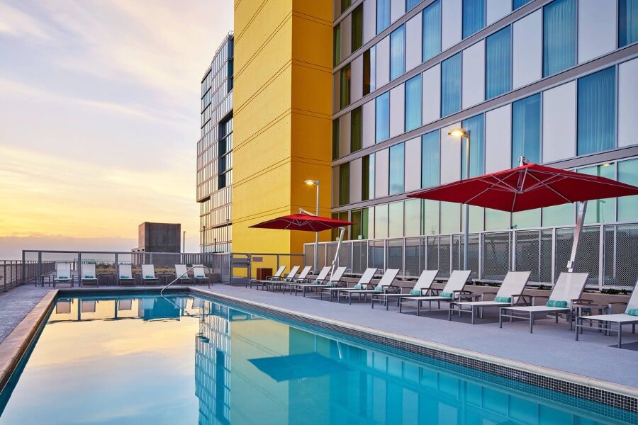 SpringHill Suites Bayside San Diego best hotels swimming pool and sunloungers at sunset