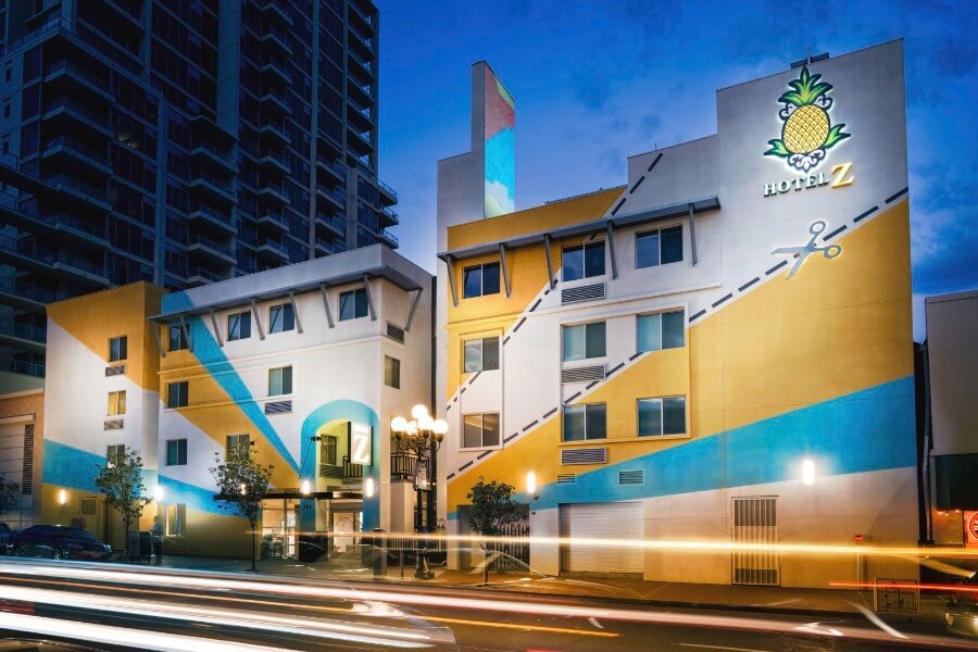 Hotel Z staypineapple one of the best hotels in San Diego by previous guest ratings exterior of building colored yellow and blue