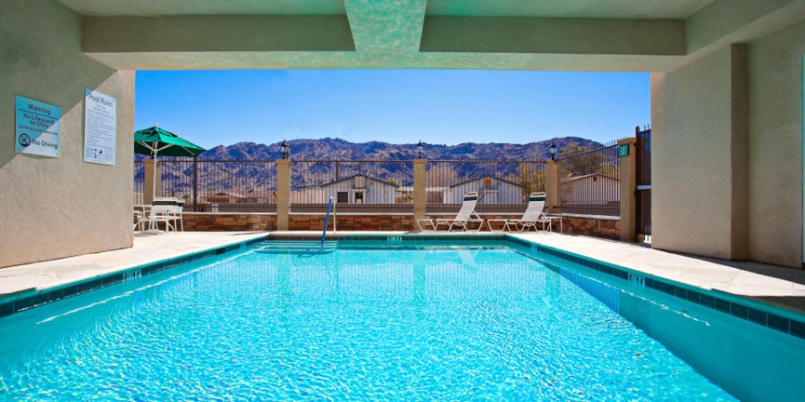 Holiday Inn express swimming pool with mountain view in California desert