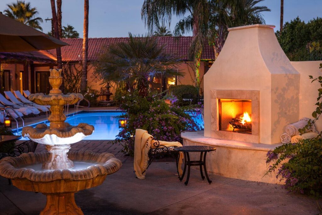 Lovely courtyard fire and swimming pool at a hotel in palm springs california