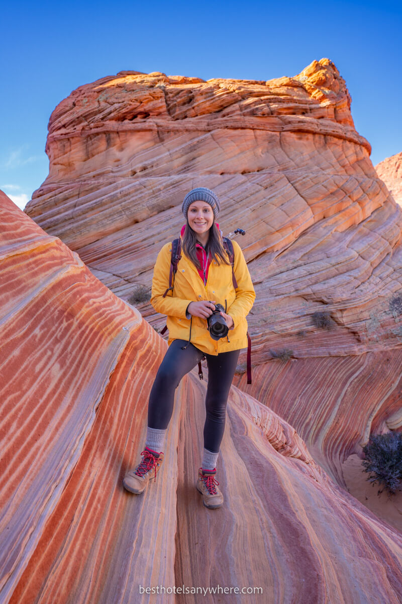 Kristen Morgan from Best Hotels Anywhere hiking on stunning rock formations at The Wave in Arizona on a cool day in December