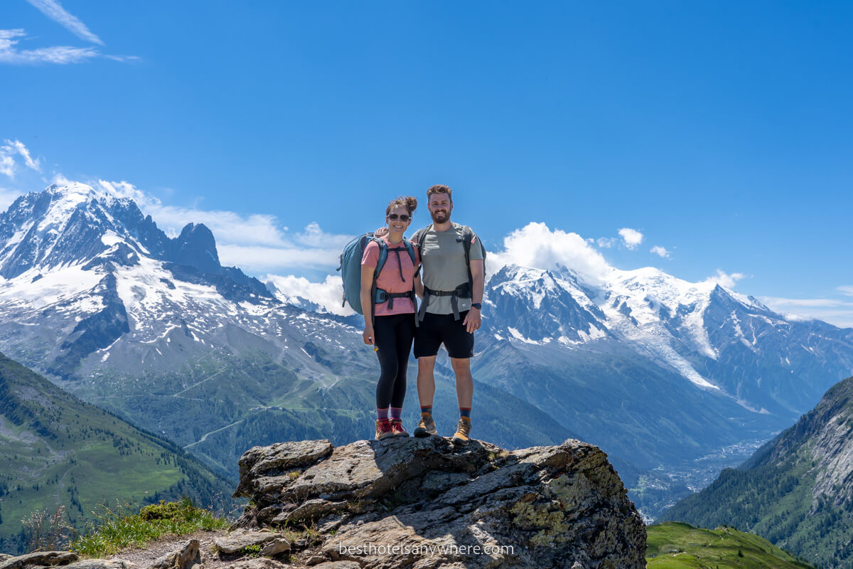 Mark and Kristen Morgan Best Hotels Anywhere hiking Tour du Mont Blanc near Chamonix in France on a sunny day with blue sky
