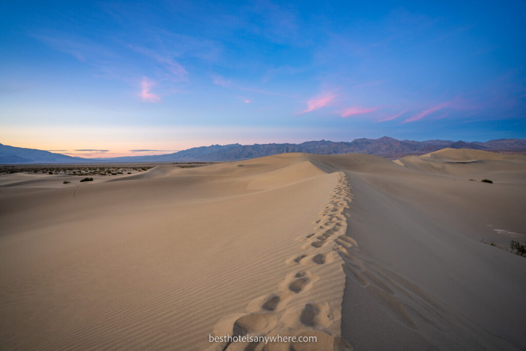 Mesquite Sand Dunes with footprints at dusk in Death Valley National Park