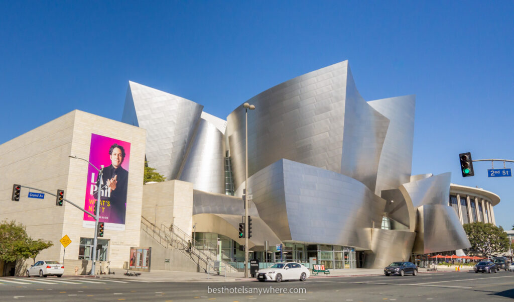 Walt Disney Concert Hall in downtown LA shiny wave facade against blue sky