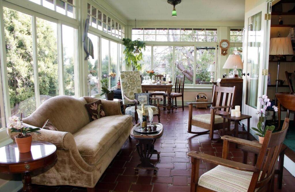 Old vintage furniture in a conservatory sunroom bed and breakfast hotels in Monterey CA