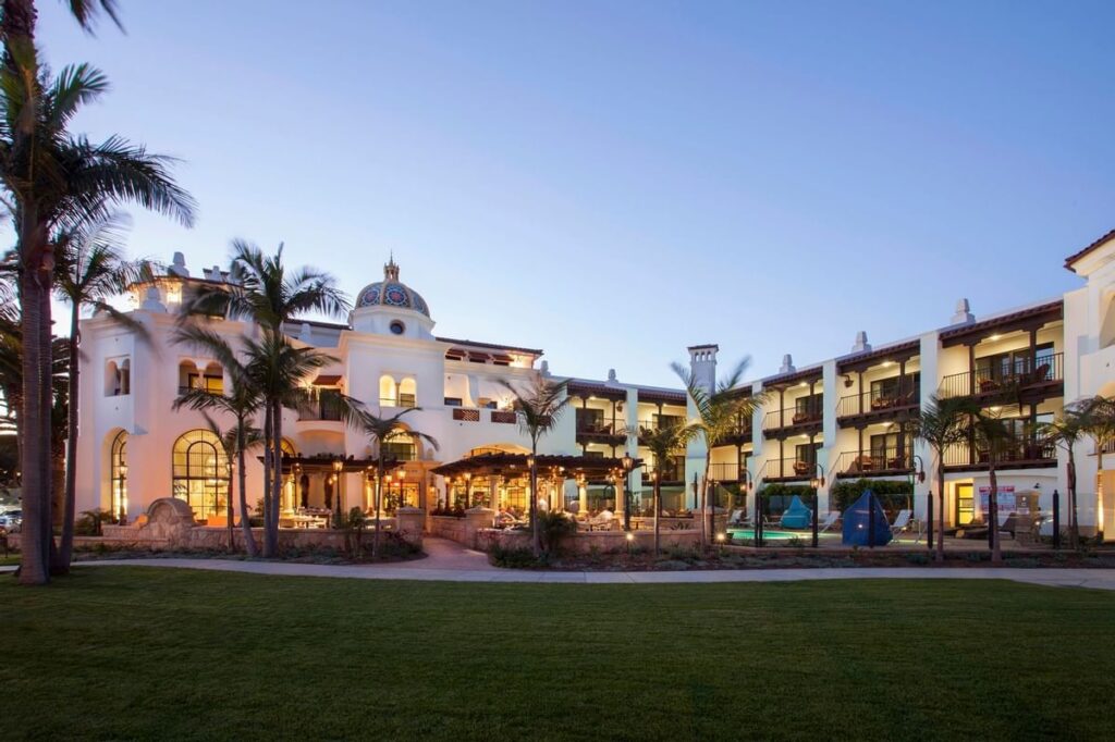 Santa Barbara Inn highly rated place to stay near east beach at dusk with blue sky