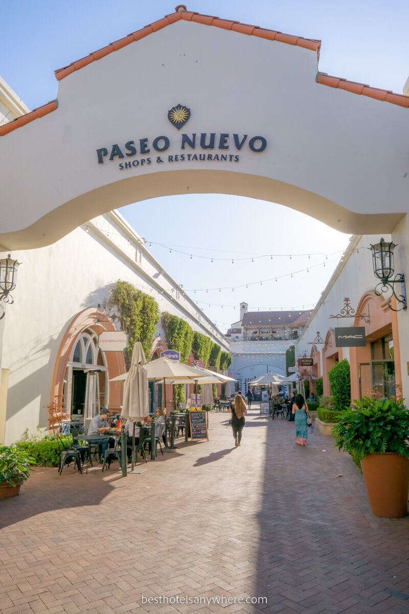 Paseo Nuevo shopping area arch way leading to outdoor shops in Santa Barbara California
