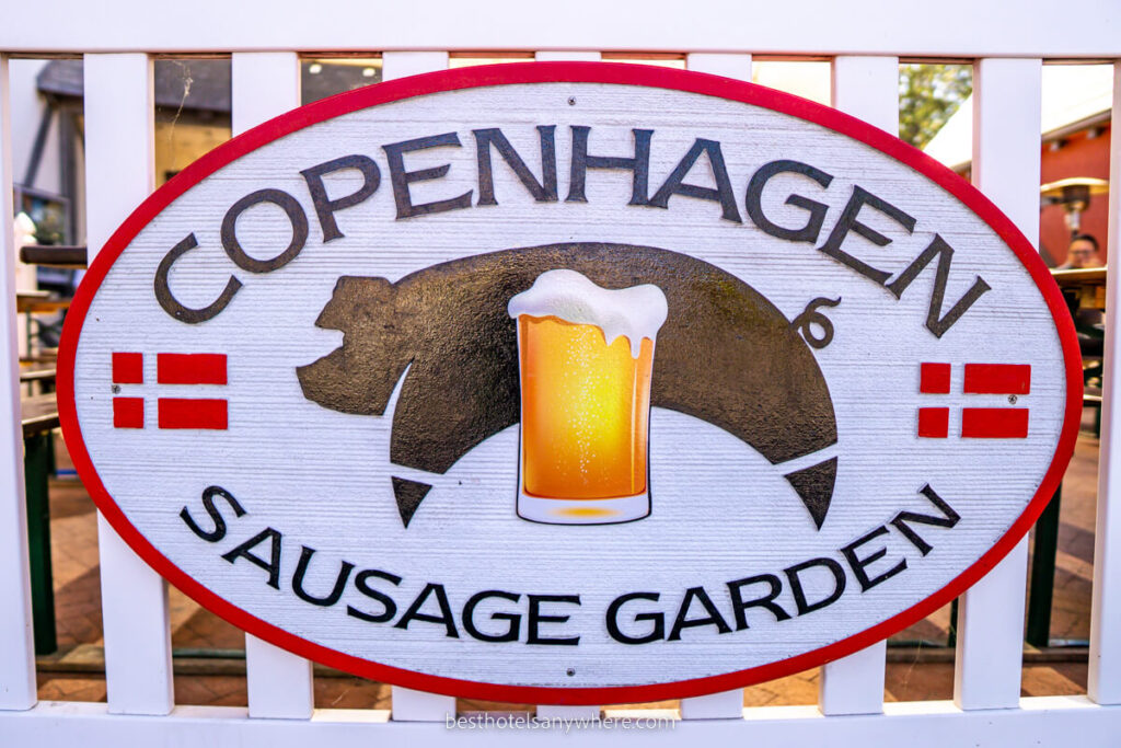 Copenhagen Sausage Garden sign with pig and beer in Danish inspired town of Solvang in California