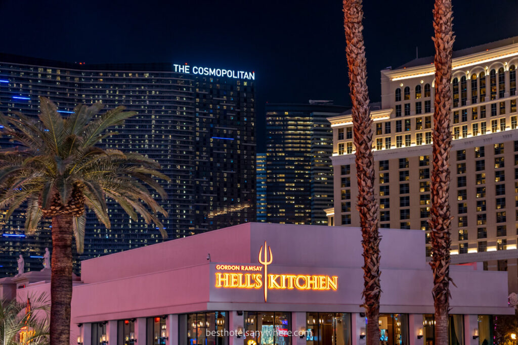 Hell's Kitchen and the Cosmopolitan Hotel in the background at night in Nevada