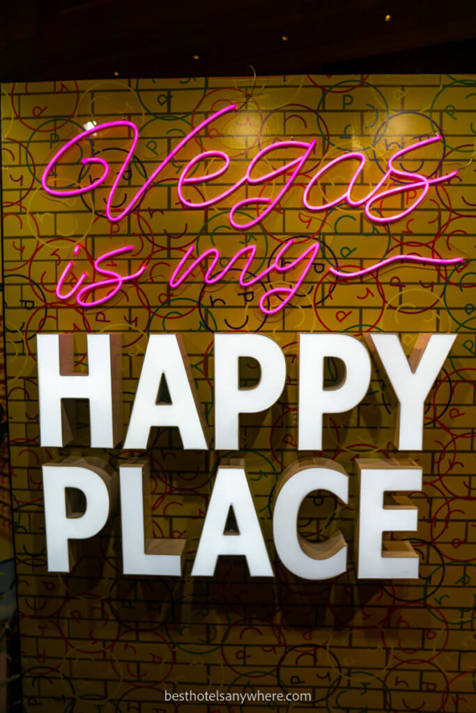 Vegas is my happy place sign with neon pink letters