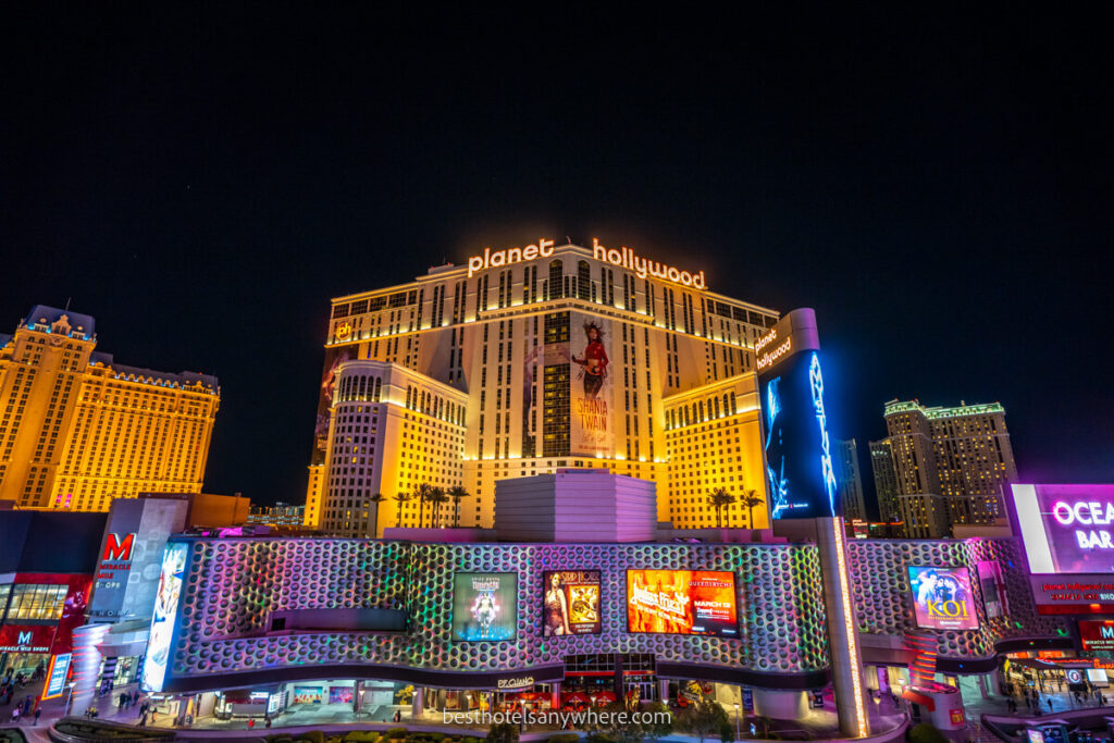 Planet Hollywood hotel and casino lit up at night one of the most popular centrally located Las Vegas hotels on the strip