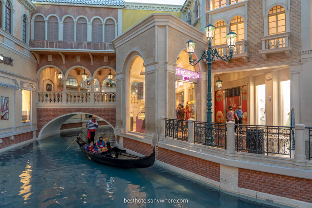 Gondola ride inside Venetian Hotel with facade Italian streets