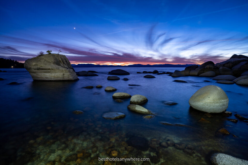 Bonsai Rock Lake Tahoe at sunset with light painting on rocks