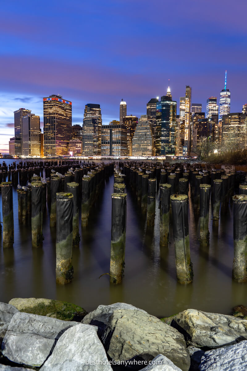 Old Pier 1 popular NY photography spot overlooking Lower Manhattan at dusk with colorful sky