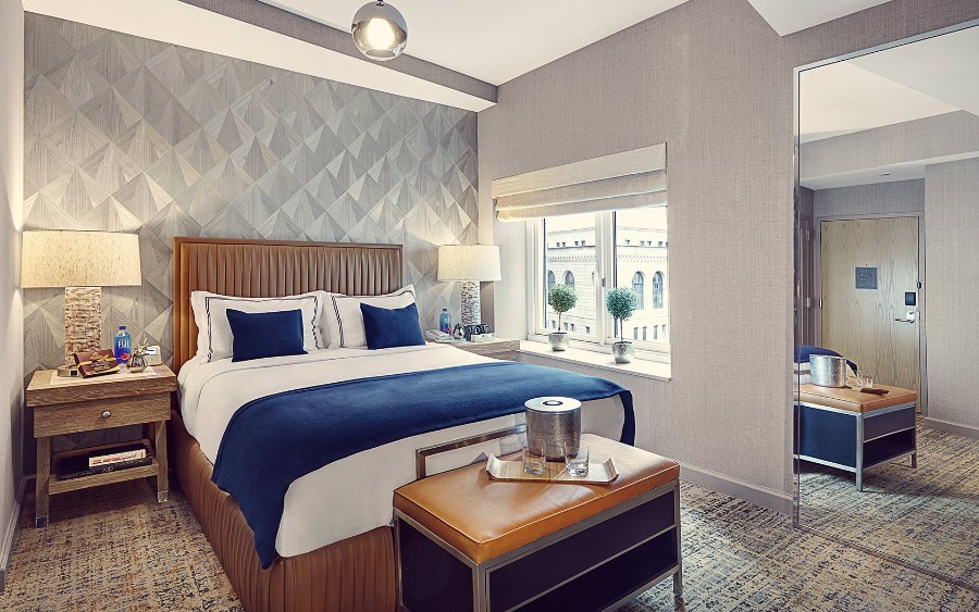 Luxury guest bedroom at The Artezen Hotel in NYC with fine furnishings