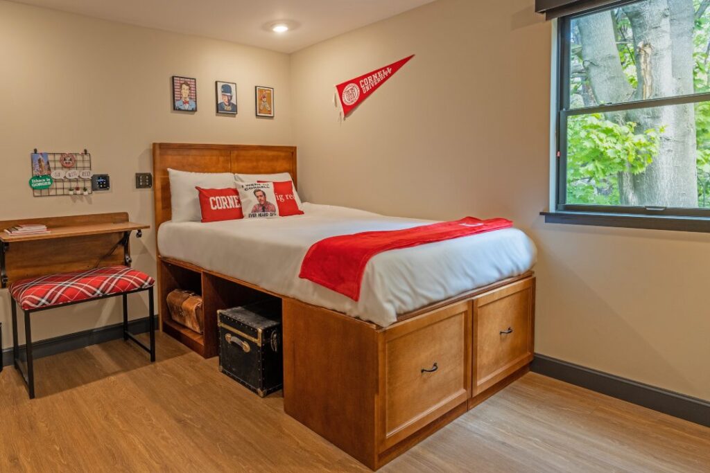 Dormitory themed guest room with Cornell merchandise