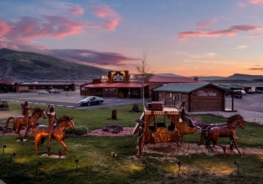Sunset over Cody WY and Cody Cowboy Village with small wooden buildings