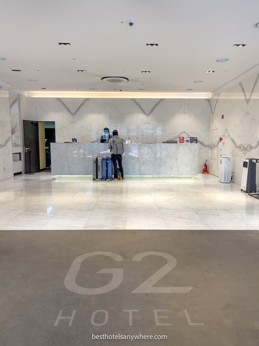 Tourist checking into the G2 hotel in Myegondong Seoul