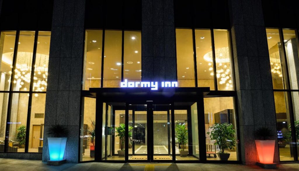 Entrance to Dormy Inn hotel in Seoul at night