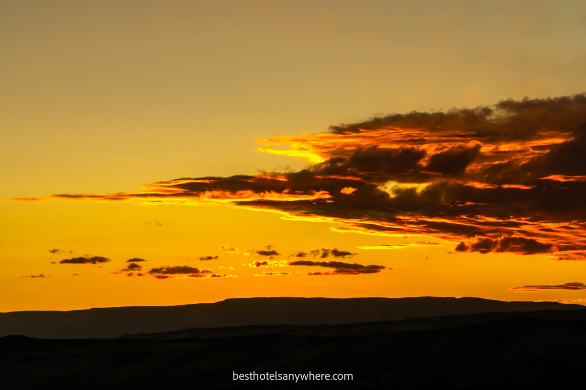 Spectacular sunset on scenic byway 12 in Utah with clouds glowing red