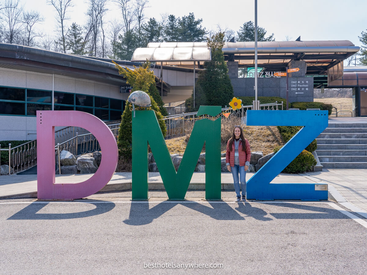 Tourist at the DMZ sign in Korea on a sunny day