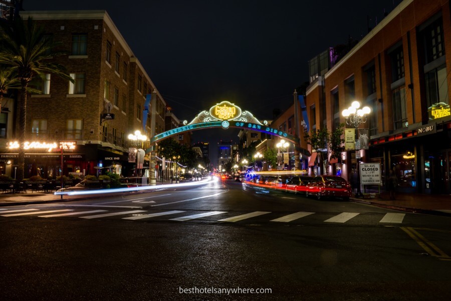 Gaslamp Quarter sign at night with cars leaving light streams long exposure photograph