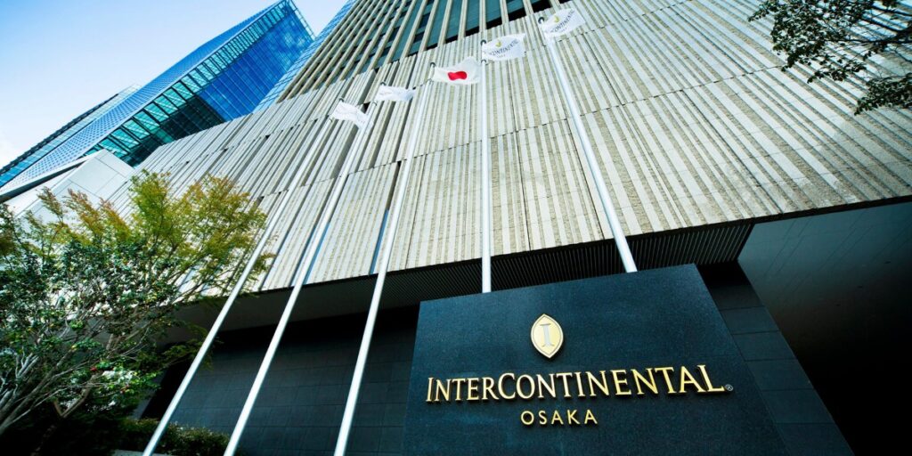 Exterior photo of the entrance to InterContinental Osaka looking up at the building