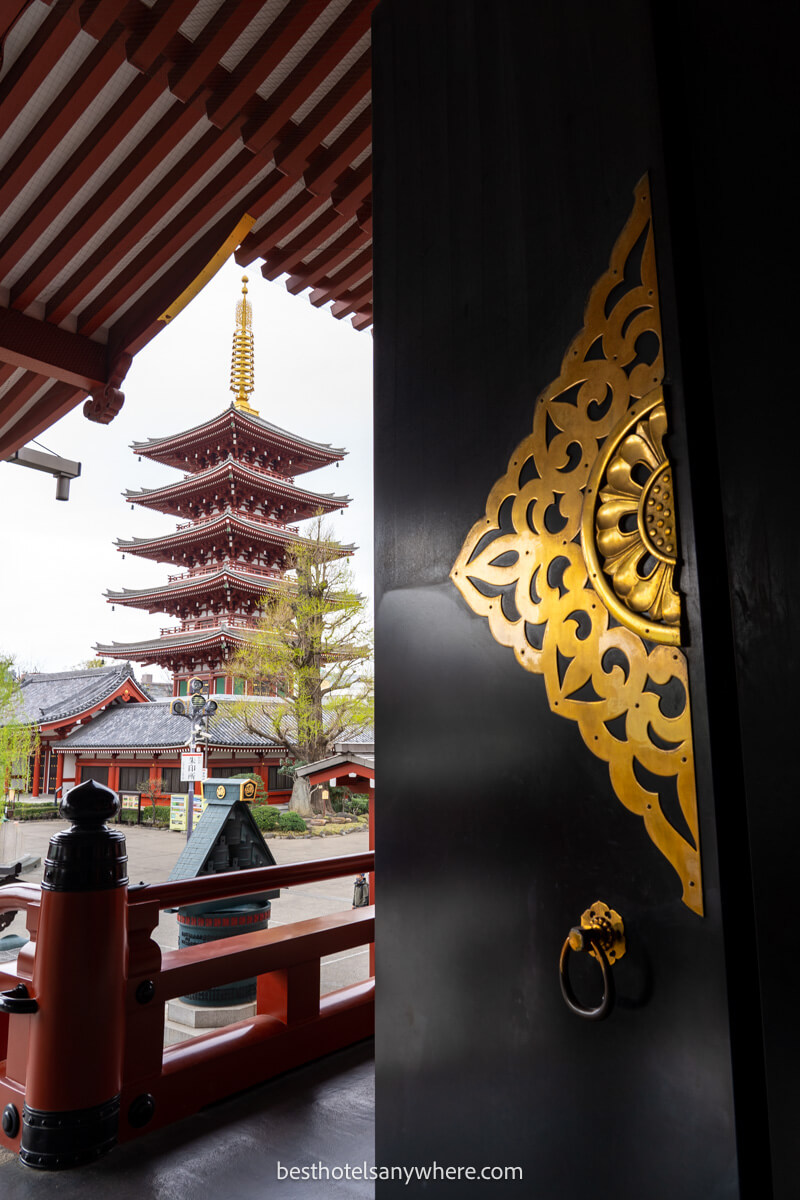 Five story pagoda at Senso-ji Temple with patterned door and roof