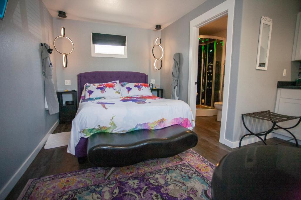 Inside a quirky guest bedroom with carpet and bed
