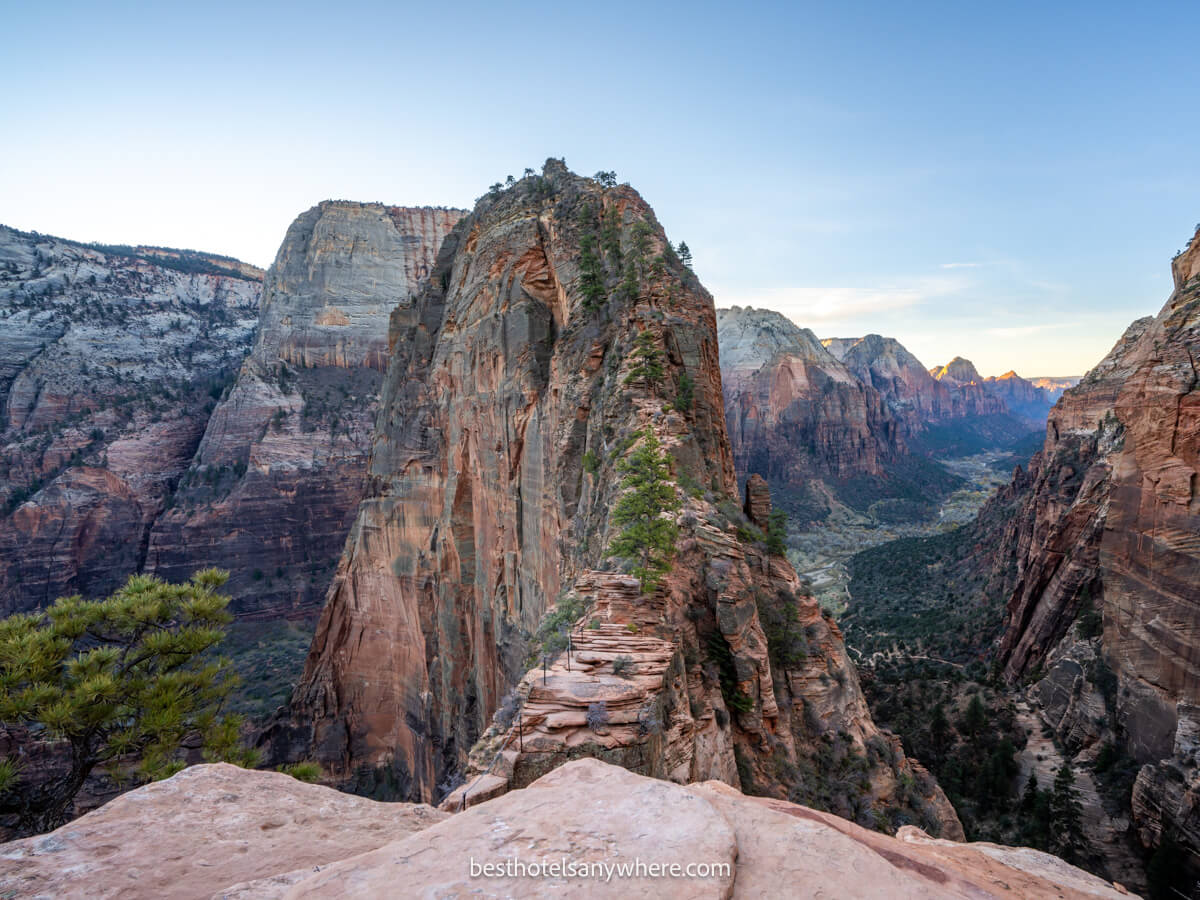 The razor thin summit climb to Angels Landing in Zion at sunrise with no hikers on the path