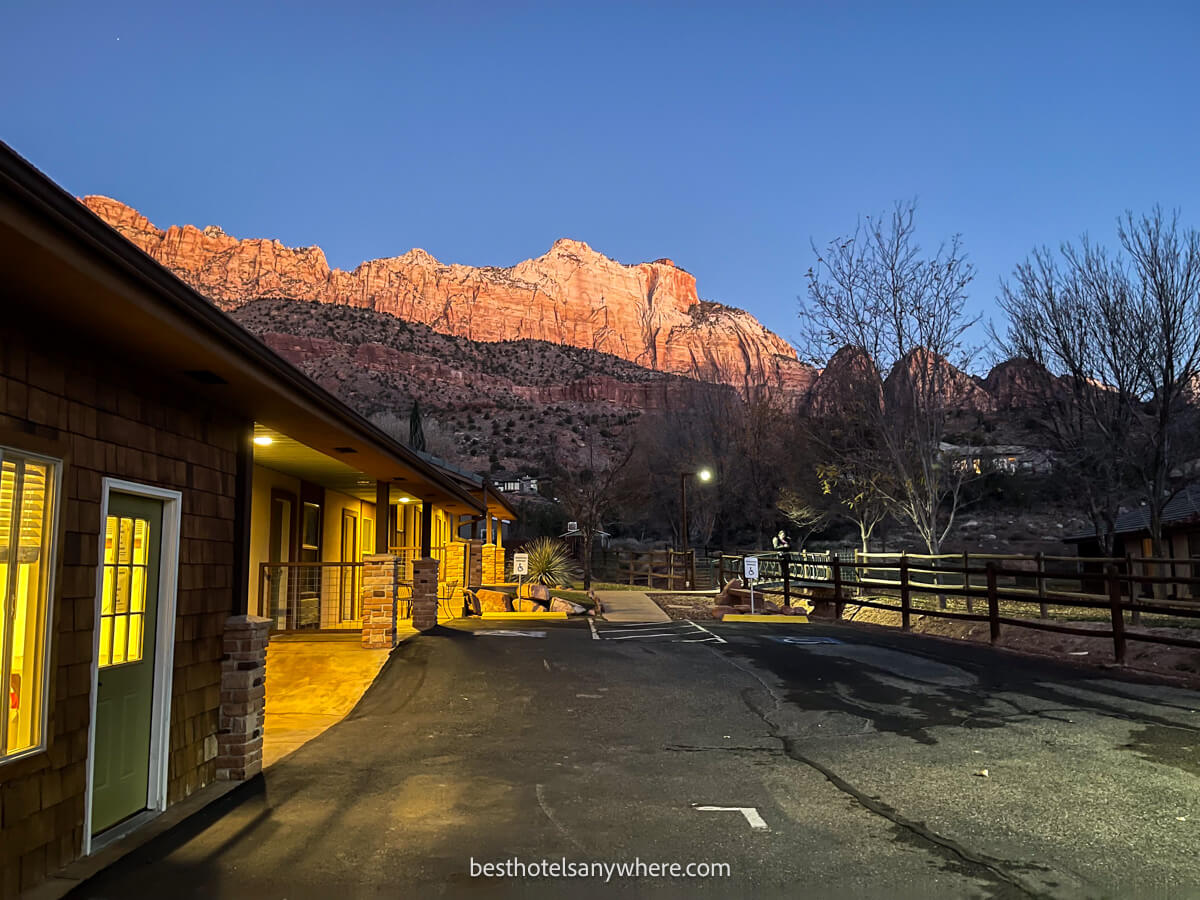 The view over Zion's red rock canyon walls from a hotel in Springdale at sunrise