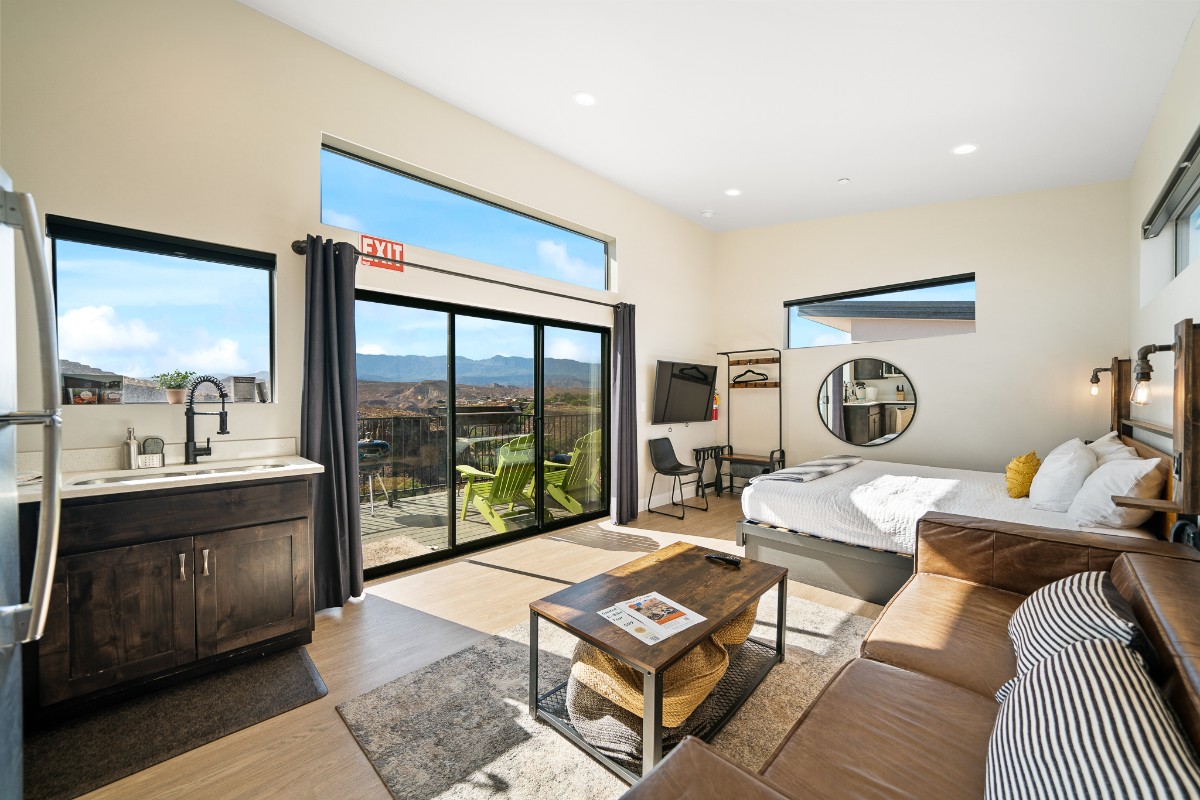 Inside an upscale condo apartment in La Verkin Utah with luxury furnishings and a fantastic view through the doors