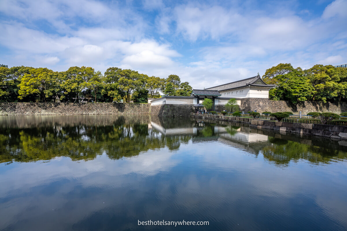 Photo of the exerior of Tokyo Imperial Palace with reflection in the moat
