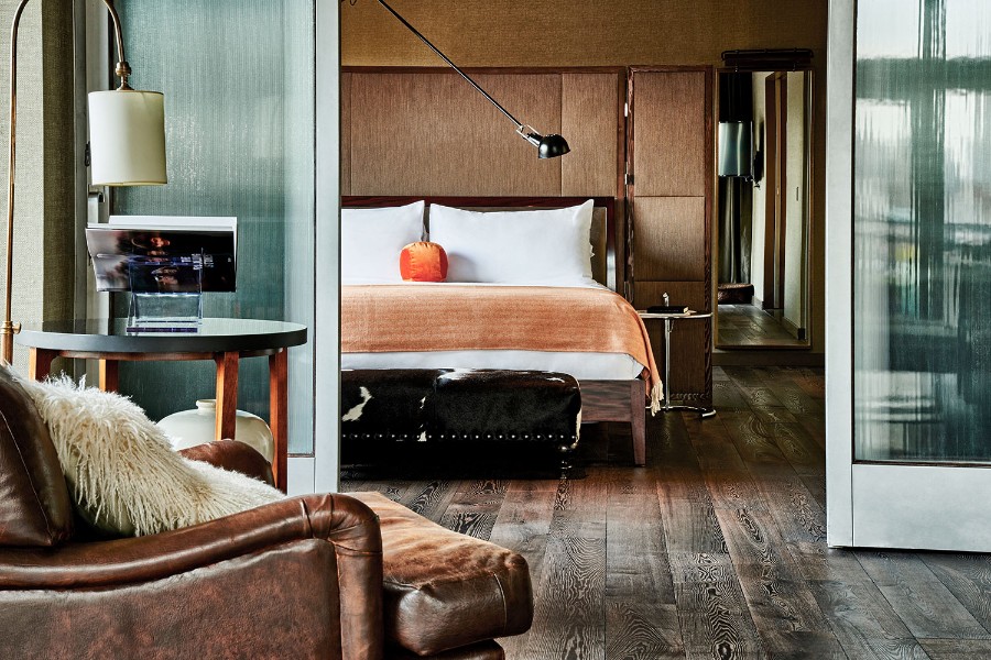 Guest bedroom at SoHo Grand Hotel in NYC plush wooden floor with quality furnishings