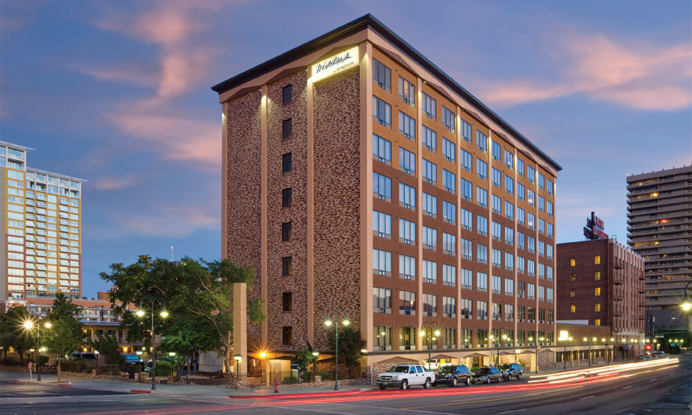 Exterior photo of WorldMark Reno hotel at twilight